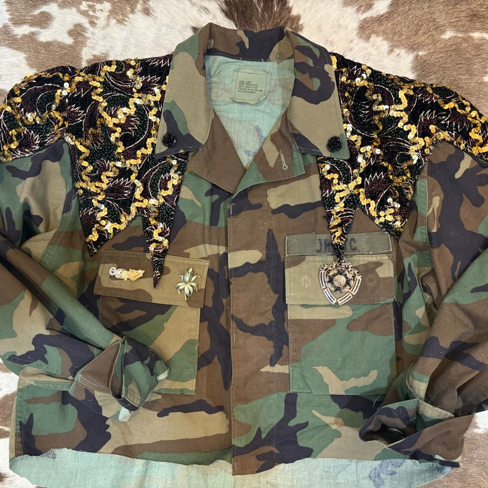 Camouflage Utility Jacket with Embroidered Accents and vintage pins